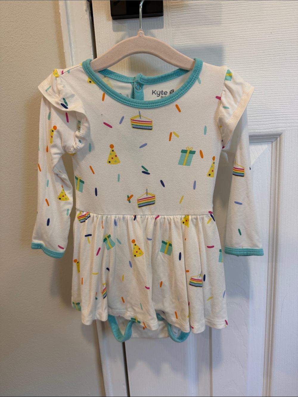 Kyte BABY Cream Party Print Long Sleeve Dress Bodysuit with Teal Trim